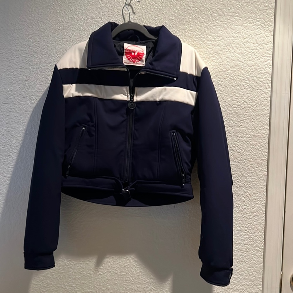 Nice jacket for winter!   Size 42  colors are navy and white